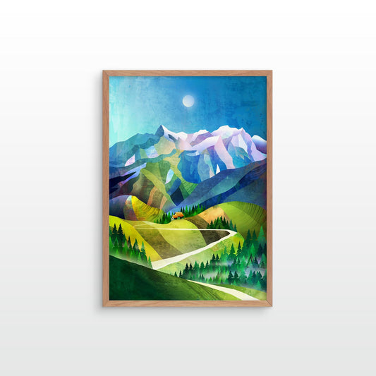 A framed art print depicting a stylized mountain landscape with green hills, evergreen trees, and snow-capped peaks under a blue sky, shown hanging on a light gray wall.