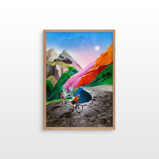 A print featuring a colorful, stylized mountain landscape with cyclists in the foreground, displayed on a clean white wall.