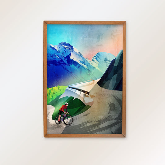 Cyclist acending on the mountain asfphalt road