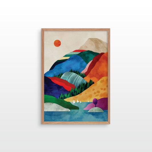A framed art print featuring a colorful, geometric mountain landscape with a lake, trees, and a sun.
