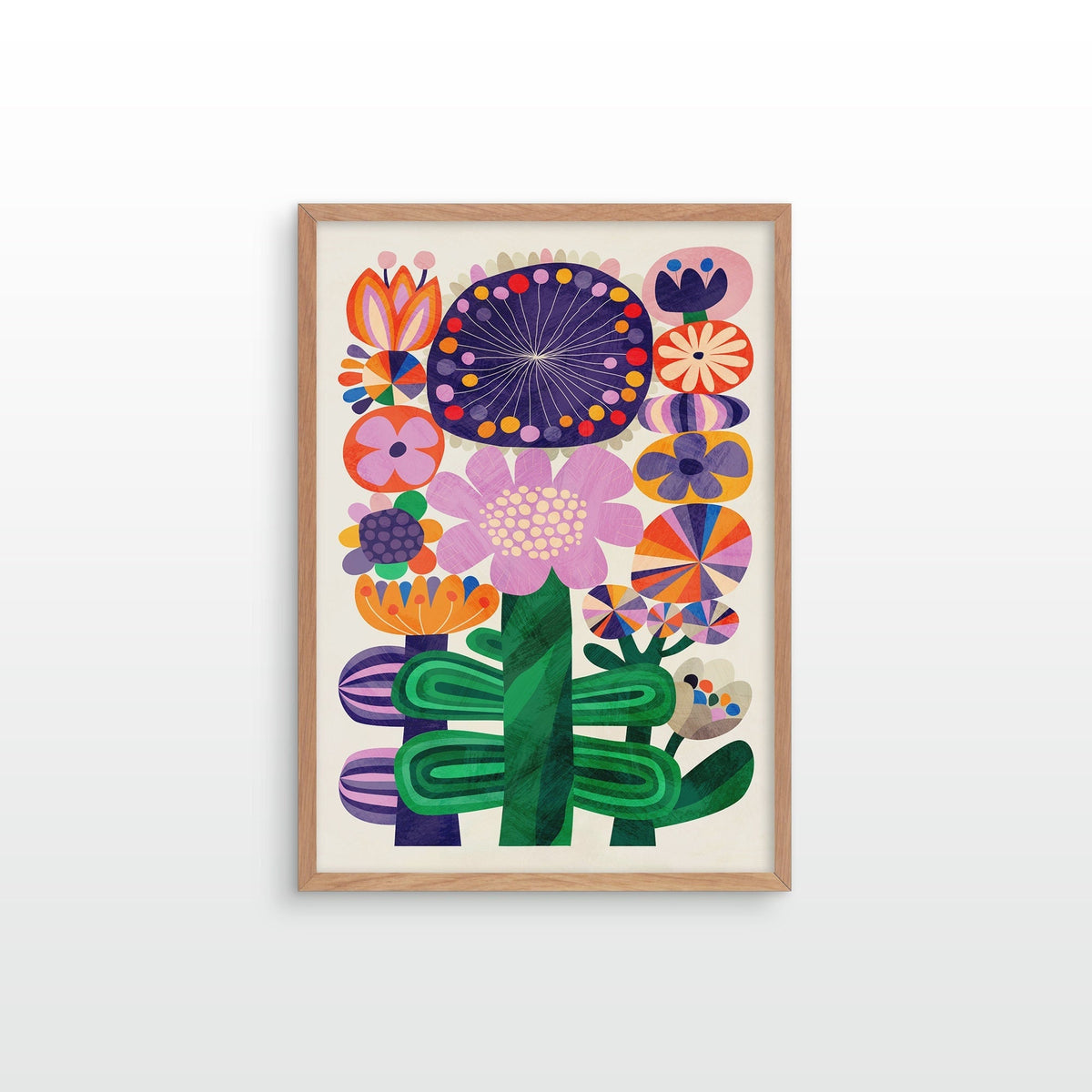 A framed art print featuring a colorful, retro-style botanical illustration of flowers and cacti, set against a clean white background.