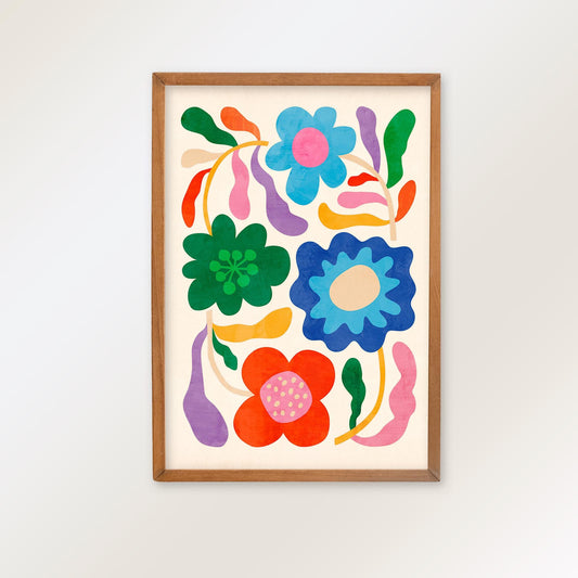 A framed art print featuring a colorful retro floral pattern with bold shapes in blue, green, red, pink, orange, and purple on a cream background.