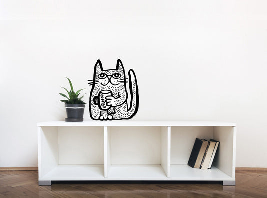 A black and white cartoon cat wall decal holding a coffee mug