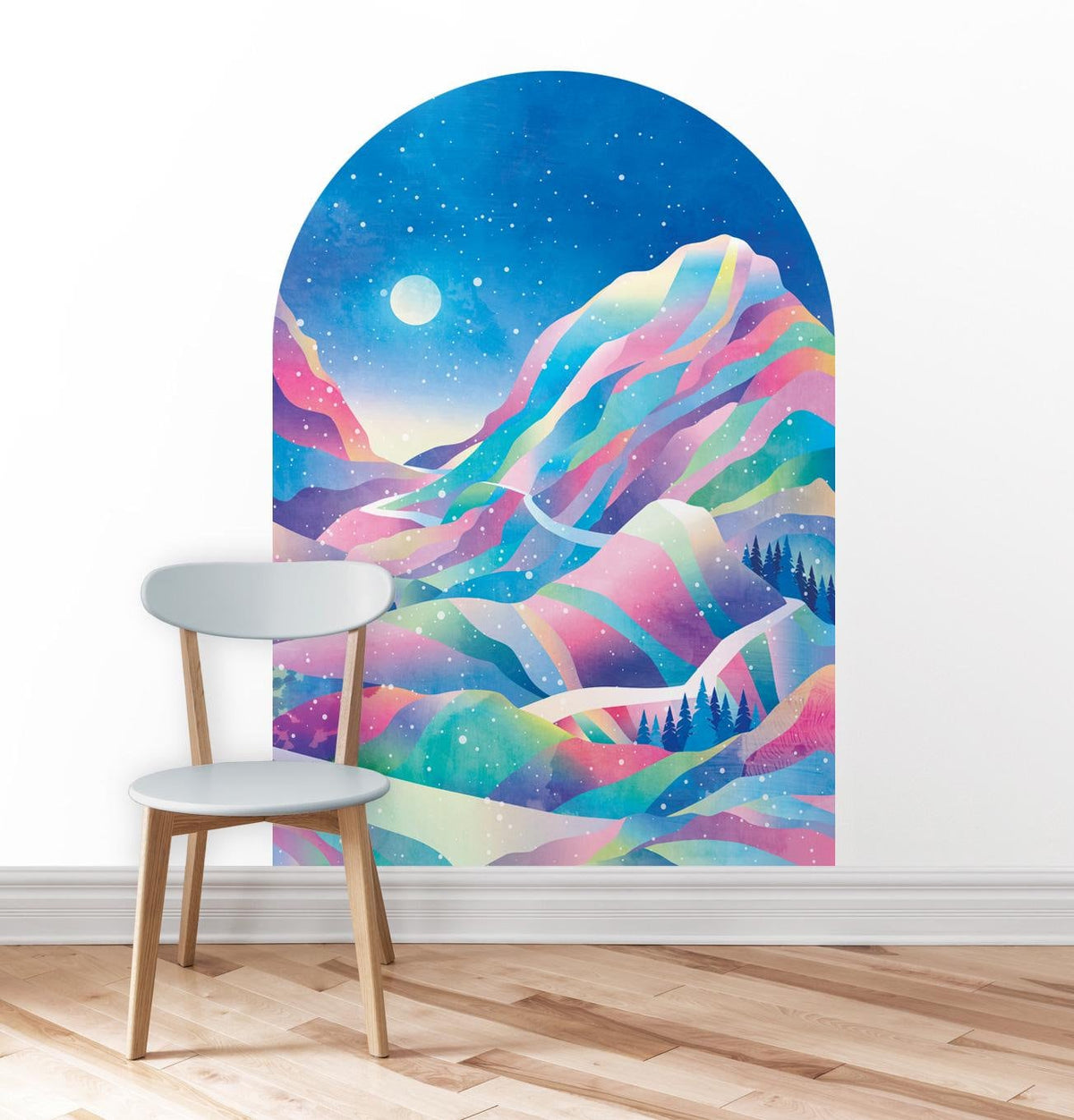 A colorful arched wall mural depicting a pastel rainbow mountain landscape under a starry night sky