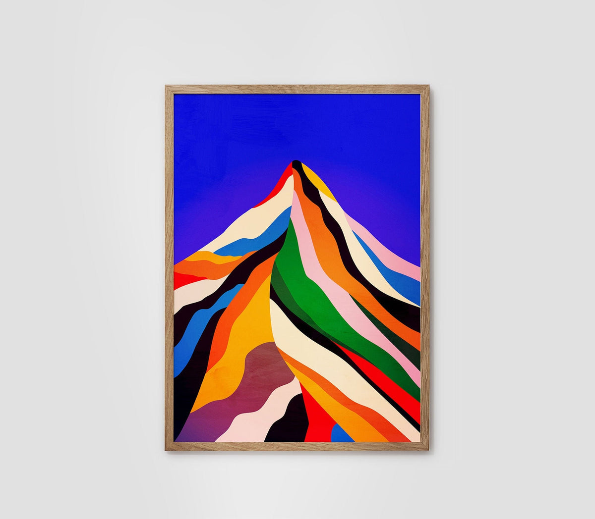 A framed abstract art print featuring a colorful mountain peak with bold diagonal stripes in blue, orange, green, pink, yellow, black, and white