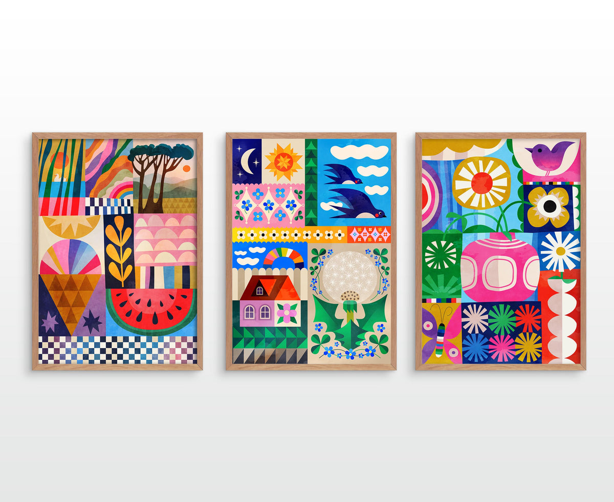 Three colorful framed art prints with whimsical folk-art style illustrations, displayed side-by-side on a light gray wall.